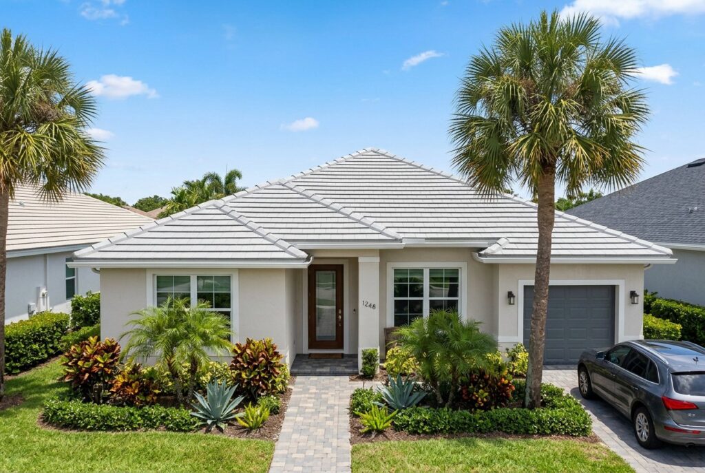 Home with a new light gray tile roof