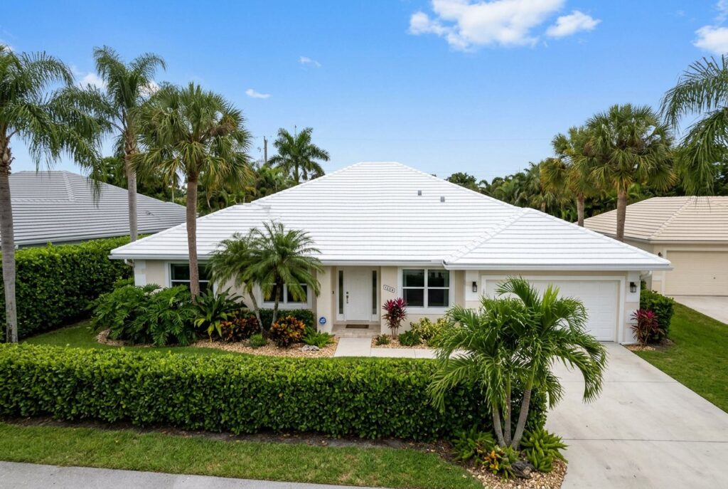 Home with a new white tile roof
