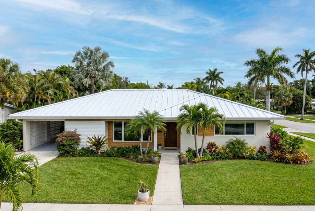 Mid-century home with a new white metal roof
