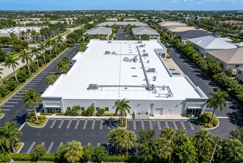 Commercial building with a new white TPO roof